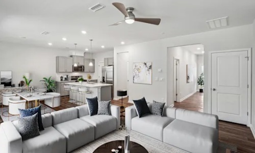 a living room with couches and a coffee table